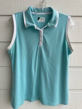 IZOD Golf ladies blue sleeveless tank. Large 100% polyester